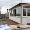 Abuso sul terrazzo condominiale: la demolizione non può essere imputata al singolo senza provarne la responsabilità