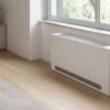 Fan coil idronico a mobile installato sotto una finestra
