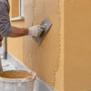 Intonaco colorato per esterni: tipi, supporti, applicazione, difetti e manutenzione
