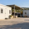 Prefabbricati e depositi aziendali: l’uso stabile non è edilizia libera